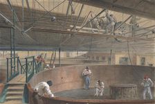 Coiling the Cable in the Large Tanks at the Works of the Telegraph Construction..., 1865, 1865. Creator: Robert Charles Dudley