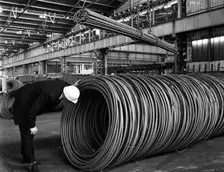 Coils and hexagonal bars at the Park Gate Iron & Steel Co, Rotherham, South Yorkshire, 1964. Creator: Michael Walters