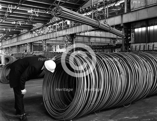 Coils and hexagonal bars at the Park Gate Iron & Steel Co, Rotherham, South Yorkshire, 1964. Artist: Michael Walters