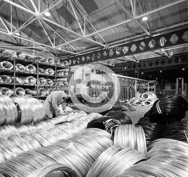 Coils of steel wire, Tinsley Wire Co, Sheffield, South Yorkshire, 1972. Creator: Michael Walters.