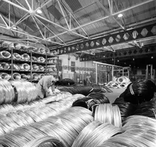 Coils of steel wire, Tinsley Wire Co, Sheffield, South Yorkshire, 1972. Creator: Michael Walters