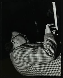 Colin Bates on the piano at The Stables, Wavendon, Buckinghamshire. Creator: Denis Williams