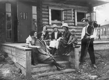Colonists Khelgut and Iva with a Group of Russian Teachers, 1927. Creator: Unknown
