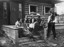 Colonists Khelgut and Iva with a Group of Russian Teachers, 1927. Creator: Unknown