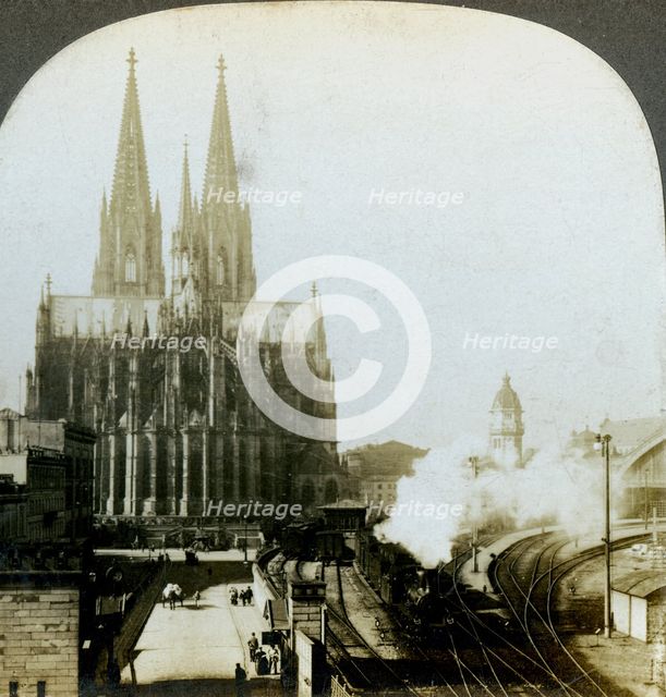 Cologne Cathedral from a railway bridge, Cologne, Germany.Artist: EW Kelley