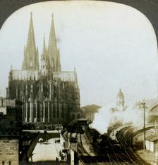 Cologne Cathedral from a railway bridge, Cologne, Germany.Artist: EW Kelley