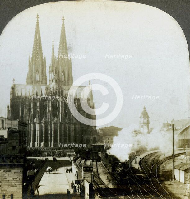 Cologne Cathedral from a railway bridge, Cologne, Germany.Artist: EW Kelley