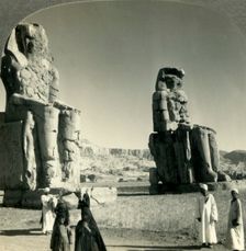 Colossal "Memnon" Statues at Thebes - the Farther One Used to Emit a Cry at Sunrise, Egypt c1930s Creator: Unknown