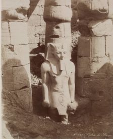 Colossal Statue of Ramesses II in the First Court of the Temple at Luxor, 19th century. Creator: Zangaki