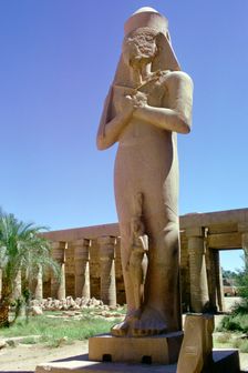 Colossal statue, Karnak, Egypt. Creator: Tony Evans