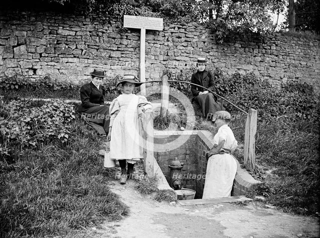 Collecting water from the village pump, Barton Hartshorn, Buckinghamshire, 1901. Artist: Alfred Newton & Sons.