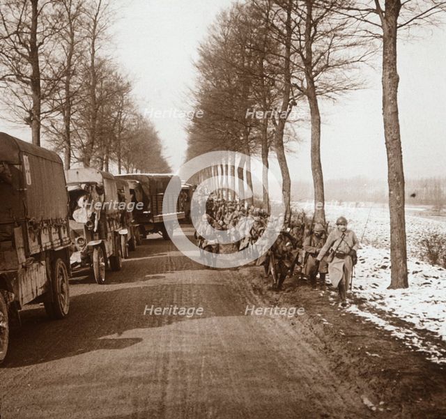 Column of trucks and troops, Somme-Tourbe, northern France, c1914-c1918. Artist: Unknown.