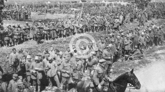 Columns of German prisoners, Somme, France, 1918. Artist: Unknown
