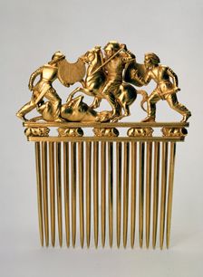 Comb with a fighting scene c400 BC