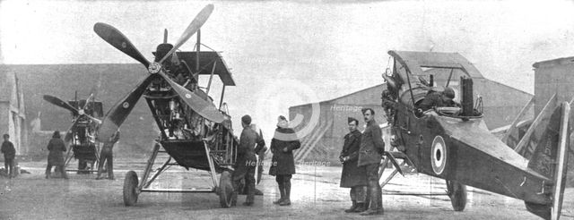 ''Combat Aerien; Parmi les forces alliees aerienes; Montage d'areoplanes repares dans un..., 1917-18 Creator: Unknown.