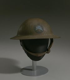 Combat helmet from World War I used by the 93rd Infantry Division, 1914-1918. Creator: Unknown