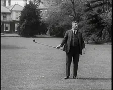 Comedian Harry Tate Attempting To Play Golf, 1920s. Creator: British Pathe Ltd