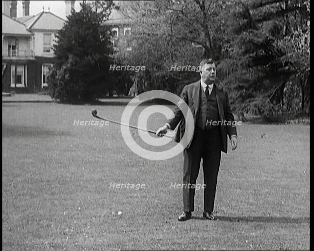 Comedian Harry Tate Attempting To Play Golf, 1920s. Creator: British Pathe Ltd.