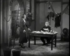 Comedian Robb Wilton On Set Playing a Fire Brigade Officer and Sitting at a Desk With Papers...,1938 Creator: British Pathe Ltd
