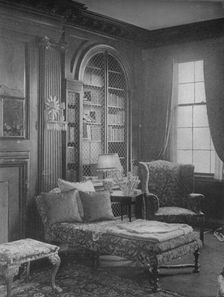 Comfortable corner in the library showing bookcase, house of Miss Anne Morgan, New York City, 1924