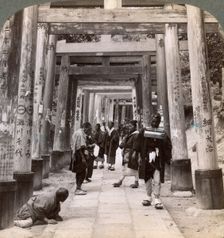 Coming and going under long rows of sacred torii, Shinto temple of Inari, Kyoto, Japan, 1904. Artist: Underwood & Underwood