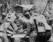 Commonwealth Troops Planning Next to a Tank, 1943. Creator: British Pathe Ltd