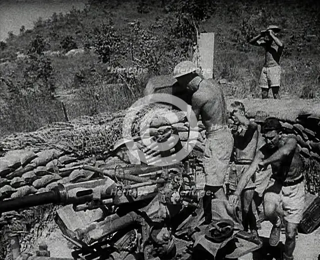 Commonwealth Troops Running to an Anti-Aircraft Gun, 1941. Creator: British Pathe Ltd.