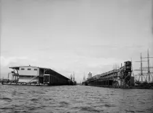Commandancia and Tarragona Street wharves, Pensacola, Fla., between 1900 and 1905. Creator: Unknown