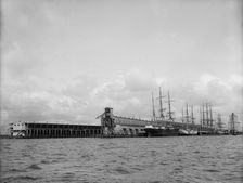 Commandancia and Tarragona Street wharves, Pensacola, Fla., between 1900 and 1905. Creator: Unknown