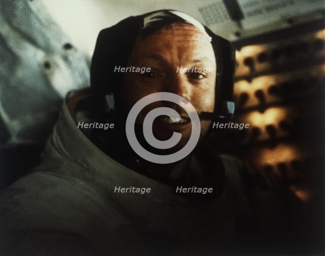 Commander Neil Armstrong in the Lunar Module on the Moon, Apollo 11 mission, July 1969. Creator: Buzz Aldrin.