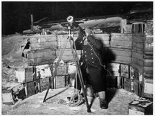 Commander Evans observing an Occulation of Jupiter Antarctica, 1910-1912. Creator: Herbert Ponting