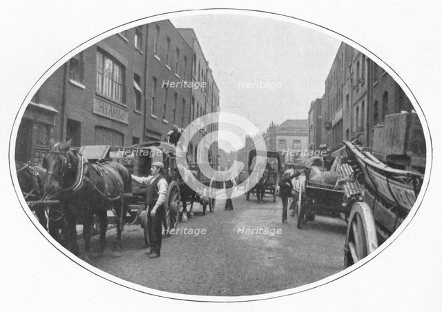 Commencing work, Osborn Street, Whitechapel, London, c1903 (1903). Artist: Unknown.