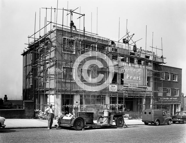 Commercial shop unit construction in Rotherham, South Yorkshire, 1962.  Creator: Michael Walters.