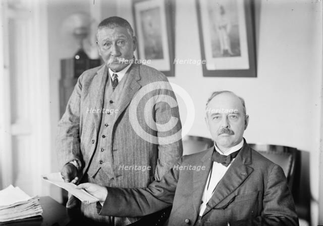 Commr. Cato Sells, Bureau of Indian Affairs, Interior Department, with Spodee, 1914. Creator: Harris & Ewing.