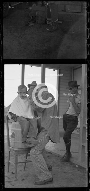 Community barber shop in Kern County migrant camp, California, 1936. Creator: Dorothea Lange.