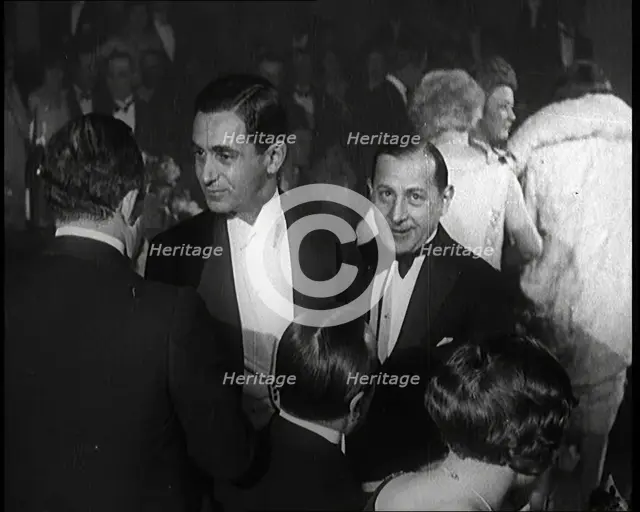Composer Irving Berlin Talking to Two Male Civilians, 1924. Creator: British Pathe Ltd.