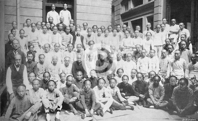 'Compositors and Pressmen, North China Daily News Office', 1910. Artist: Cox Company Ltd.