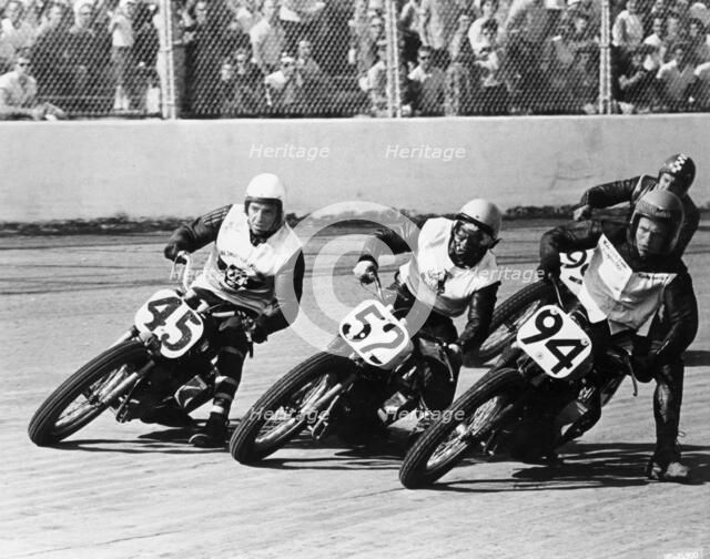 Competitors in a dirt track race, America. Artist: Unknown