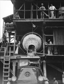 Concrete mixing plant, Birmingham, Alabama, 1936. Creator: Dorothea Lange