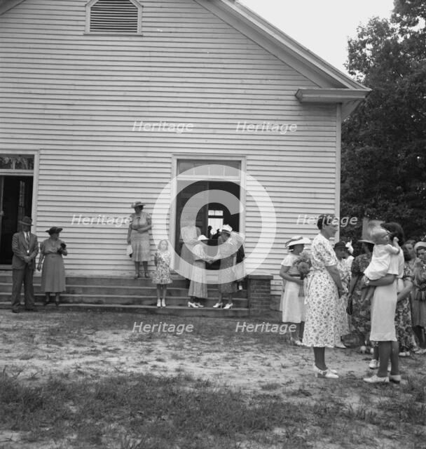 Congregation entering church, Wheeley's Church, Person County, North Carolina, 1939. Creator: Dorothea Lange.