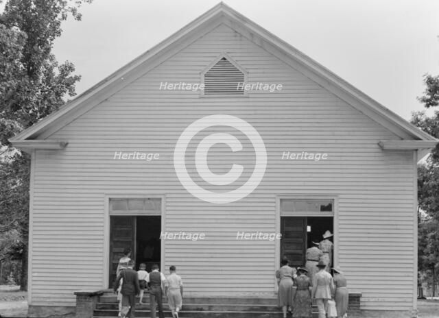 Congregation entering church, Wheeley's Church, Person County, North Carolina, 1939. Creator: Dorothea Lange.