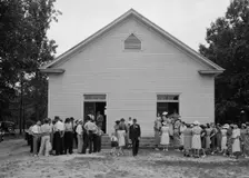 Congregation gathers in groups...Wheeley's Church, Person County, North Carolina, 1939. Creator: Dorothea Lange