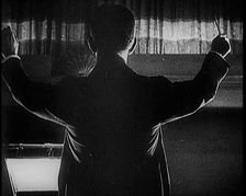 Conductor Starting a Show in London, 1922. Creator: British Pathe Ltd