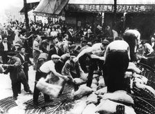 Constructing a barricade, Paris, 1944
