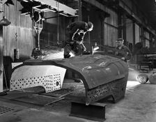 Constructing a dragline bucket, Edgar Allen's steel foundry, Sheffield, South Yorkshire, 1962. Creator: Michael Walters