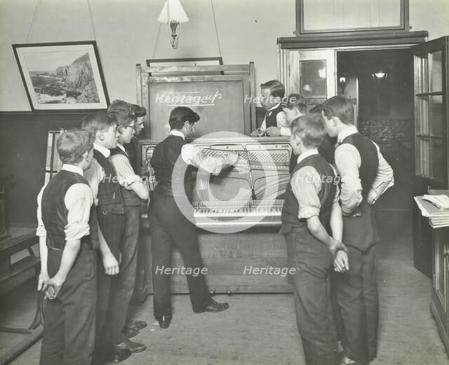 Constructing a piano, Benthal Road Evening Institute, London, 1914. Artist: Unknown.
