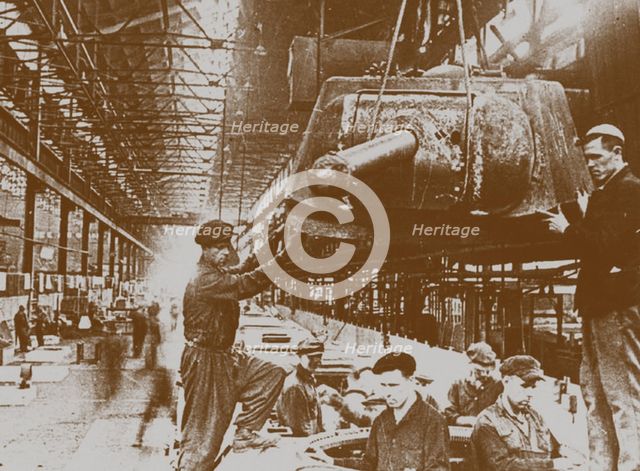 Construction of the T-34 tanks at the Kirov factory in Chelyabinsk Artist: Anonymous  