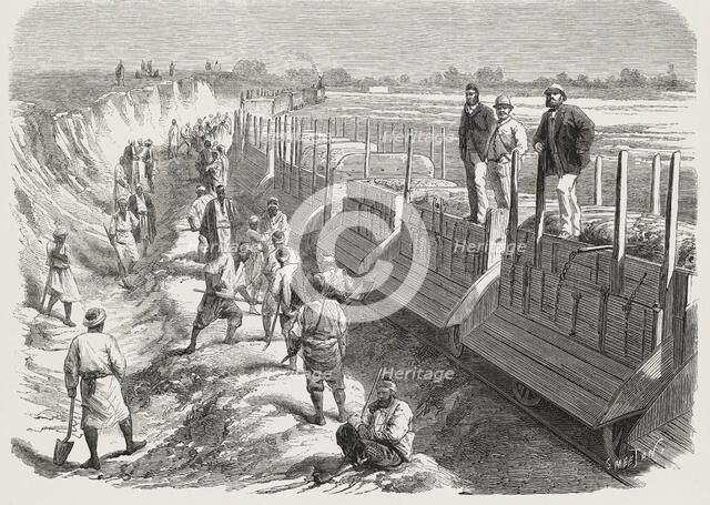 Construction of the Ismailieh fresh water canal, train for levelling the margin, Egypt, February …