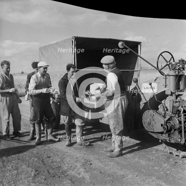 Construction of the M1, the London to Yorkshire Motorway, queuing for the catering van, 09/1958. Creator: John Laing plc.
