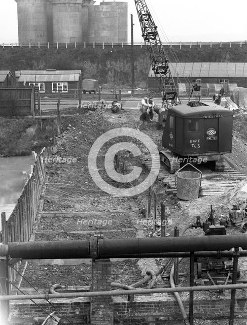 Construction of the reservoir, Manvers Main Colliery, Wath upon Dearne, South Yorkshire, 1955. Creator: Michael Walters.